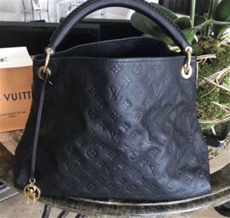 black embossed louis vuitton|authentic black louis vuitton handbags.